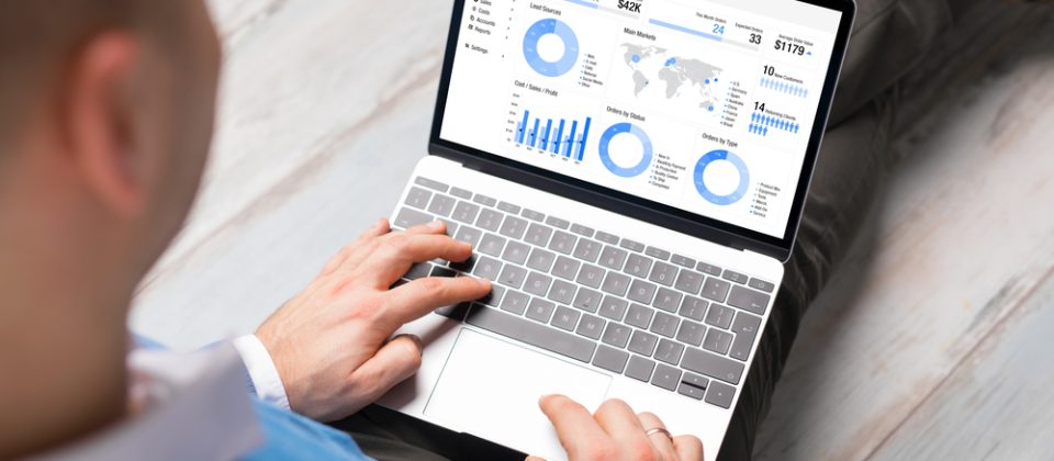 Man,Using,Crm,Software,On,Laptop,With,Different,Graphs,And Salesforce Integration